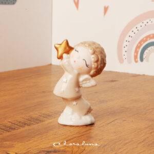 Statuetta angioletto maschio con stellina dorata