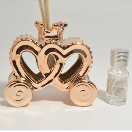 Profumatore carrozza con cuori intrecciati color oro rosa